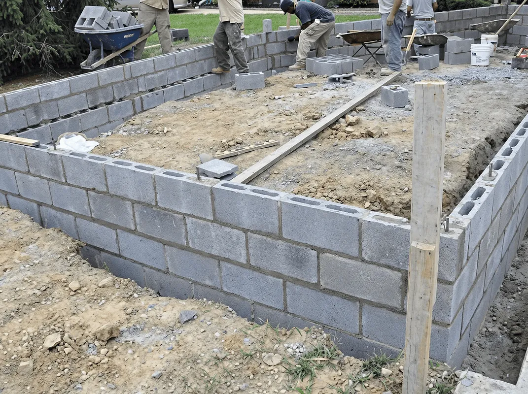 Professionals building a foundation with blocks in Memphis, TN